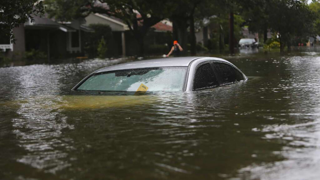 Deidre Merryweather, seen here in the background, was cited by the city of Georgetown for abandoning her car in the middle of the street.